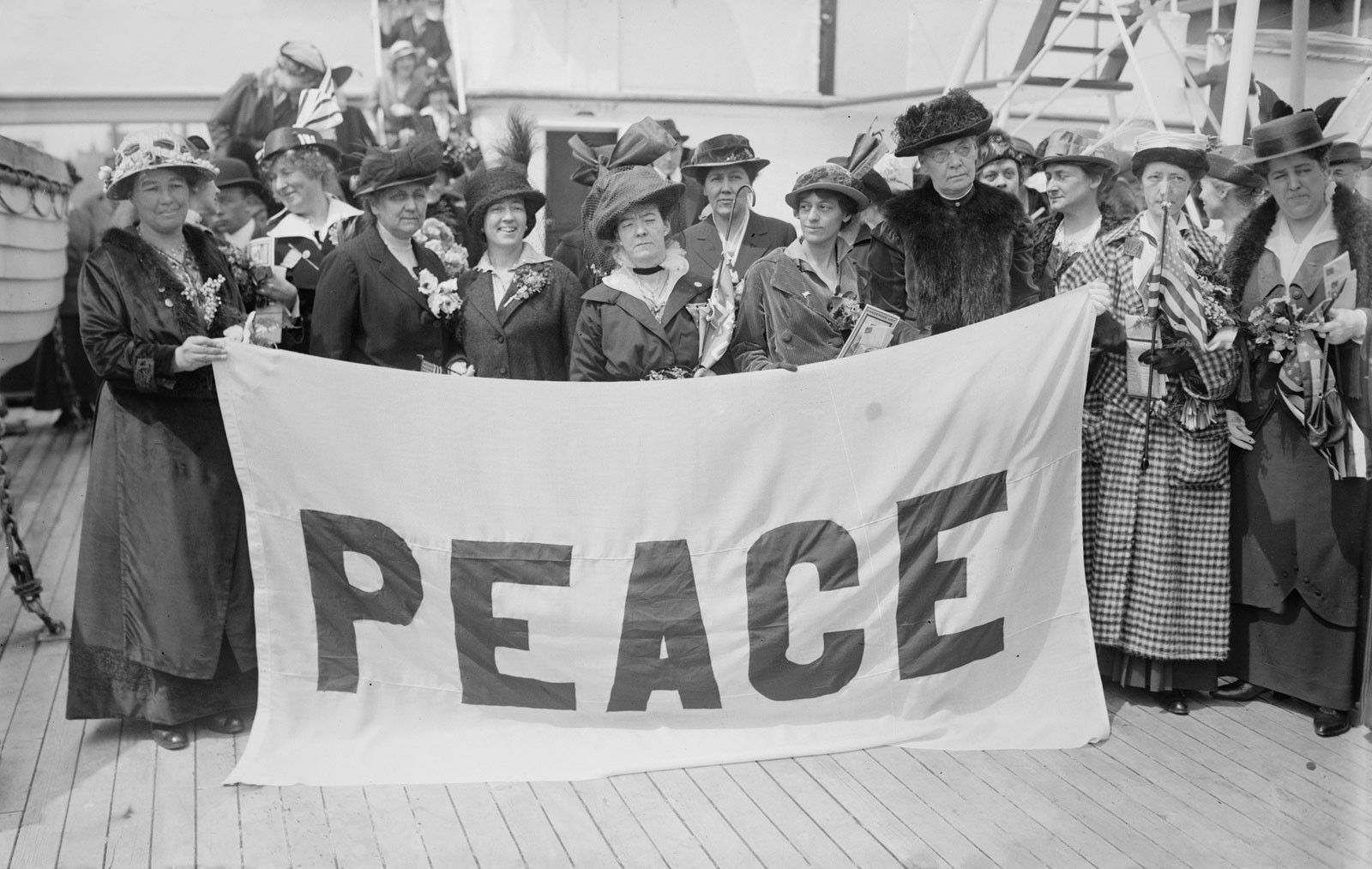 Jane Addams (second from left) and other delegates on the deck of the ship that would take them to The Hague, where the International Women’s Congress (1915) was to be held. LOC (George Grantham Bain Collection (LC-DIG-ggbain-18848) 