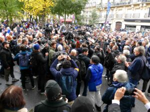 Salvador Allende Square, Paris (7th Arrondissement), November 12, 2023, March against anti-Semitism. National Rally elected officials, Marine Le Pen and Jordan Bardella surrounded by journalists. Siren-Com, CC BY 4.0, via Wikimedia Commons
