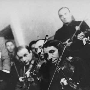 Violinists perform in the Kovno ghetto orchestra. ——US Holocaust Memorial Museum, courtesy of George Kadish/Zvi Kadushin